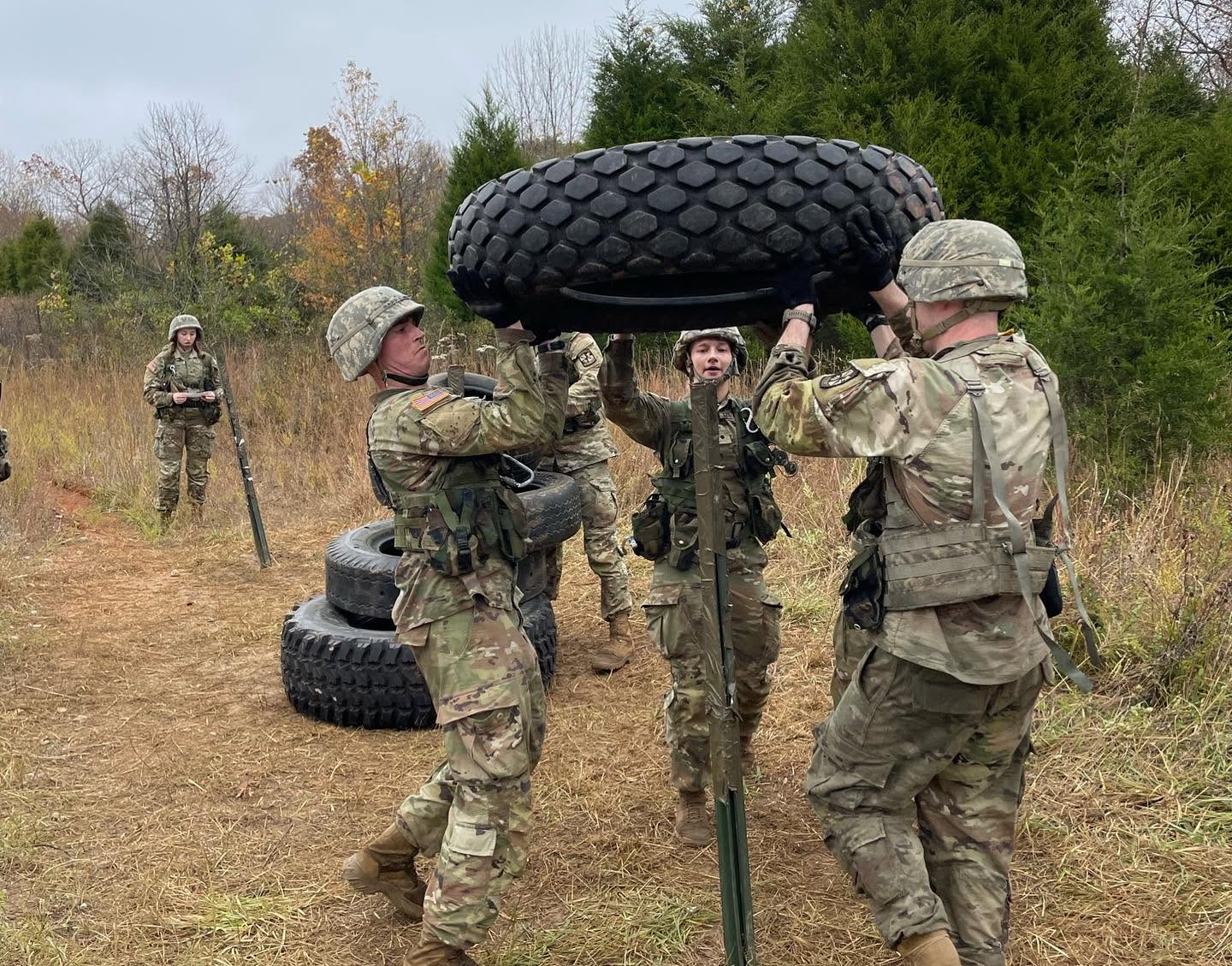 Cadets flipping tire during training